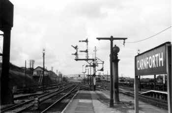After the 1939 rebuild of Carnforth Station, it changed little until the electrification of the West Coast Main Line in the early 1970's. This view to the south of the station, probably photographed in the mid 1960's could almost be any time between 1939 and 1970. Cumbrian Railway Association Bowtell Collection.