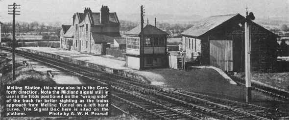 Melling Station, this view also is in the Carnforth direction. Note the Midland signal still in use in the 1950's positioned on the "wrong side" of the track for better sighting as the trains approach from Melling Tunnel on a left hand curve. The Signal Box here is sited on the platform. 