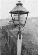 Post mounted lamp at Arkholme