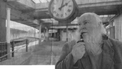 Bill Seddon, a veteran member of the rail trust, stands beneath the clock at boarded up Carnforth Station.