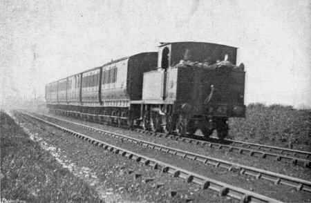 FURNESS RAILWAY TRAIN RUNNING OVER THE L.& N.W.R. BETWEEN CARNFORTH AND MORECAMBE