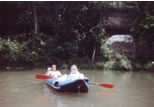 Boyce and Holly kickin it in their raft