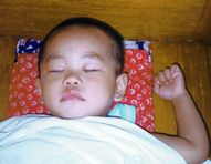 Chang Xi sleeps in Chinese Temple.