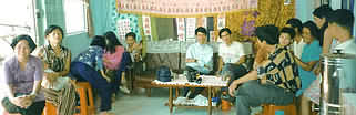 Saigon family members in living room