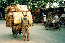 Hand cart loaded with cartons.