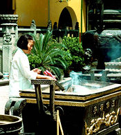 Buddha worship and burning of scented joss sticks