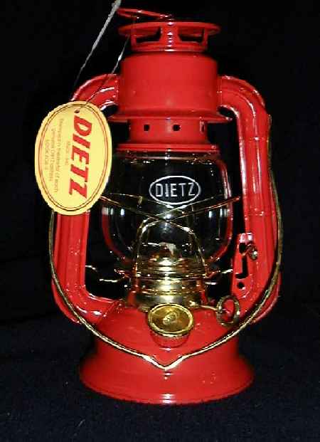 A Dietz #50 Comet Kerosene Lantern in red enamal with gold trim