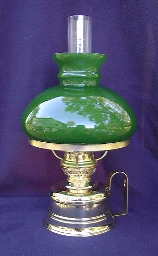 A concierge with triple layered green glass student shade