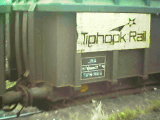 Tiphook rail JNA bogie wagon on scrap steel train.