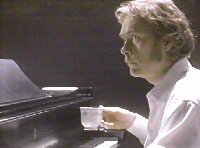 Angelo as the tea-drinking, piano playing Timmy