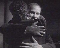 Charles embraces Jarod in Jarod's dream