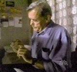 Lyle Bowman in his prison cell, decorated with paper padlocks