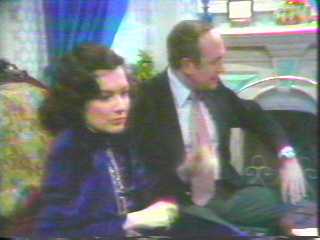 Brandy (Dixie Carter) and District Attorney Ira Paulson (Bernie Barrow)