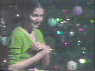 Babs Micelli (Leslie Ray) by the tree