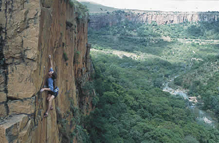 Nai on a particularly scary ascent to check out some African edelweiss