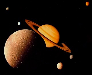 montage of Saturn and its major satellites from Voyager 1