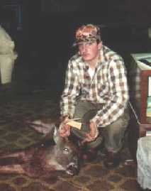 Touton showing off his buck