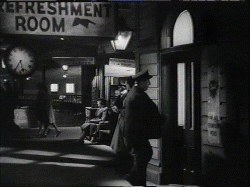 Albert Gody enters refreshment room