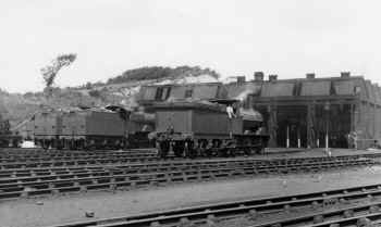 Circa 1935. Carnforth LNWR locomotive shed. H.C.Casserley LGRP2120