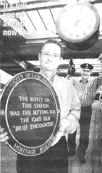 ACTION STATIONS: Peter Yates, front, and Jim Walker show off the plaque 