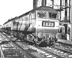 By way of contrast . . . a modern diesel, pulling the Windermere to London Euston leaving Carnforth station. 