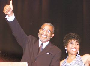 Macon Mayor Jack Ellis thumbs ride to inauguration.