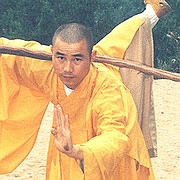 Photo of Kung Fu Master Xing Du in the Da Peng Zhan Chi position.