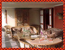 The living area is outdoors on a covered deck