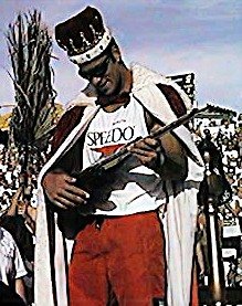 the new King admires his new guitar