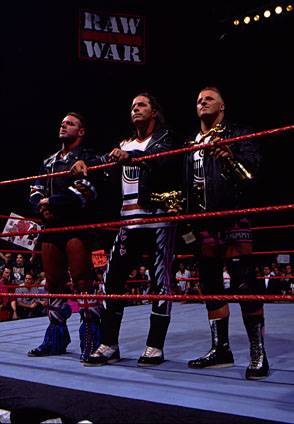 The Hart Foundation, British Bulldog, Bret Hart, and Owen.