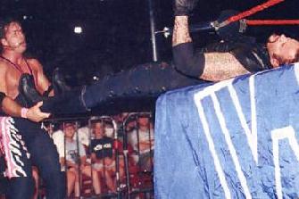 Bret Setting Up The Taker For A Figure Four 