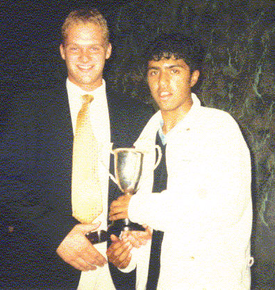 Skipper Abz recieving the cup.