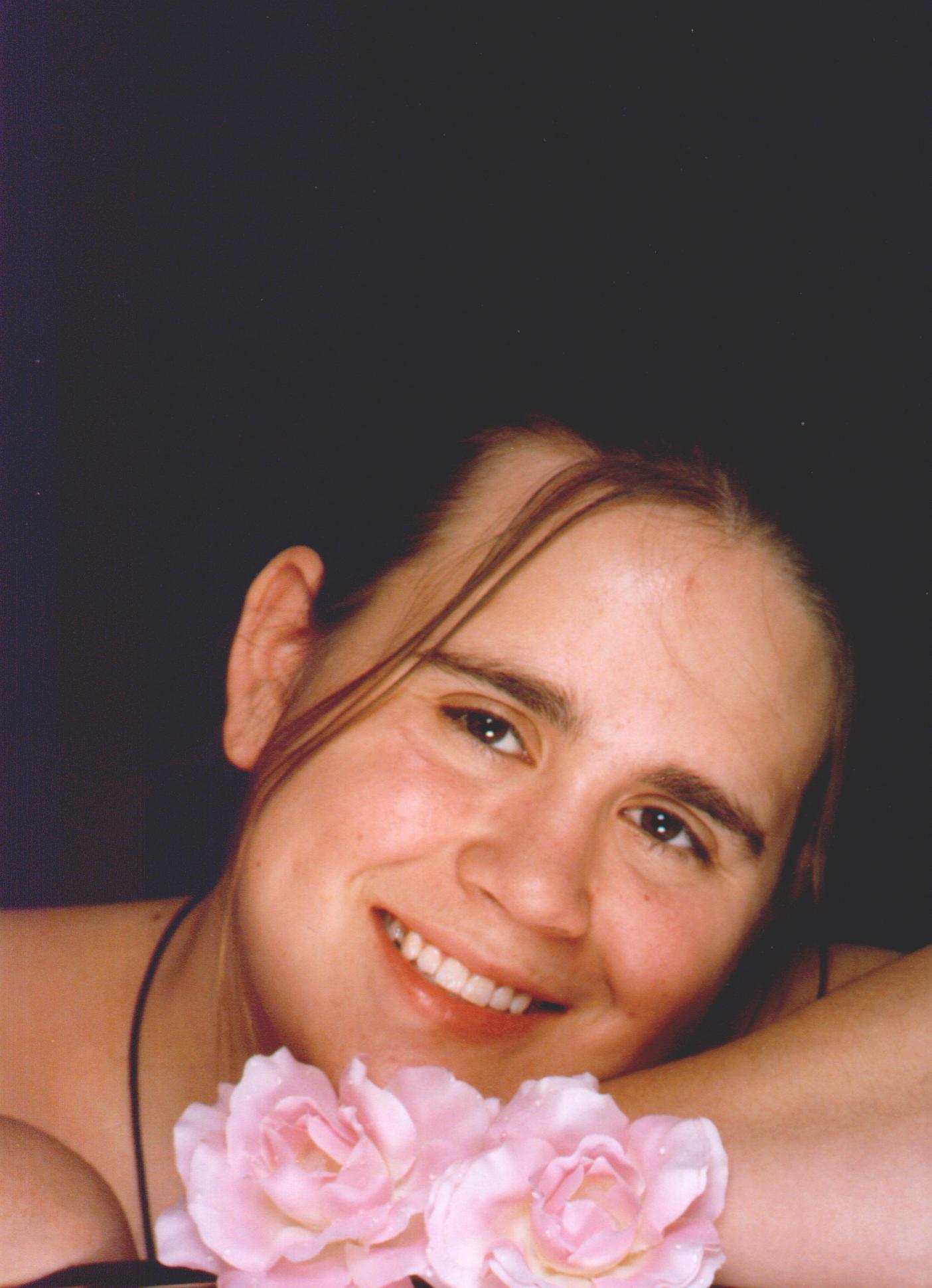 Monica with flowers.JPG (169055 bytes)