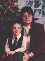 Akkk!  The dreaded Christmas photo!  (I hate pics of me!  But isn't he adorable!  Age 4 here.