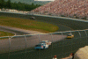 Dale Jarrett passes Todd Bodine.