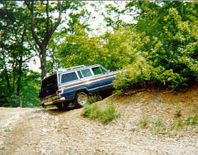Jeep going up a hill
