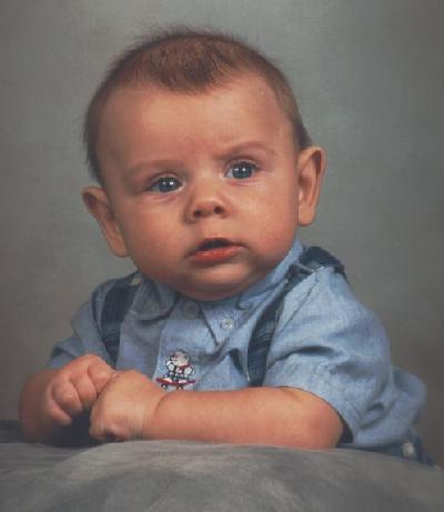 Zachary, not smiling