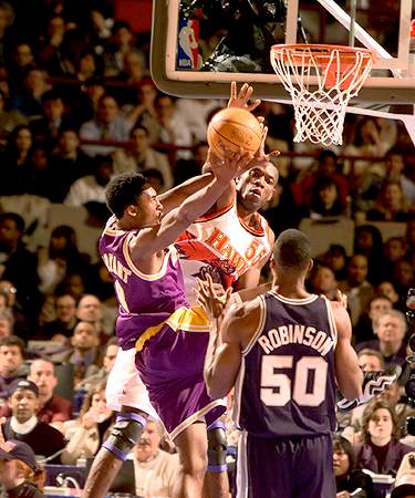 Kobe Takes It Over Mutombo Once Again