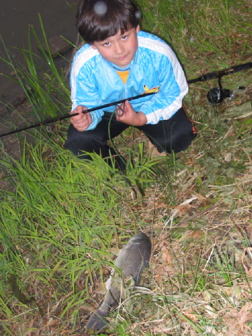 Angler with a  Freshwater Drum