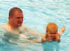 swim w dad.jpg (124932 bytes)