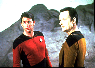 Q acking as Data with Riker