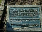 plaque at statute