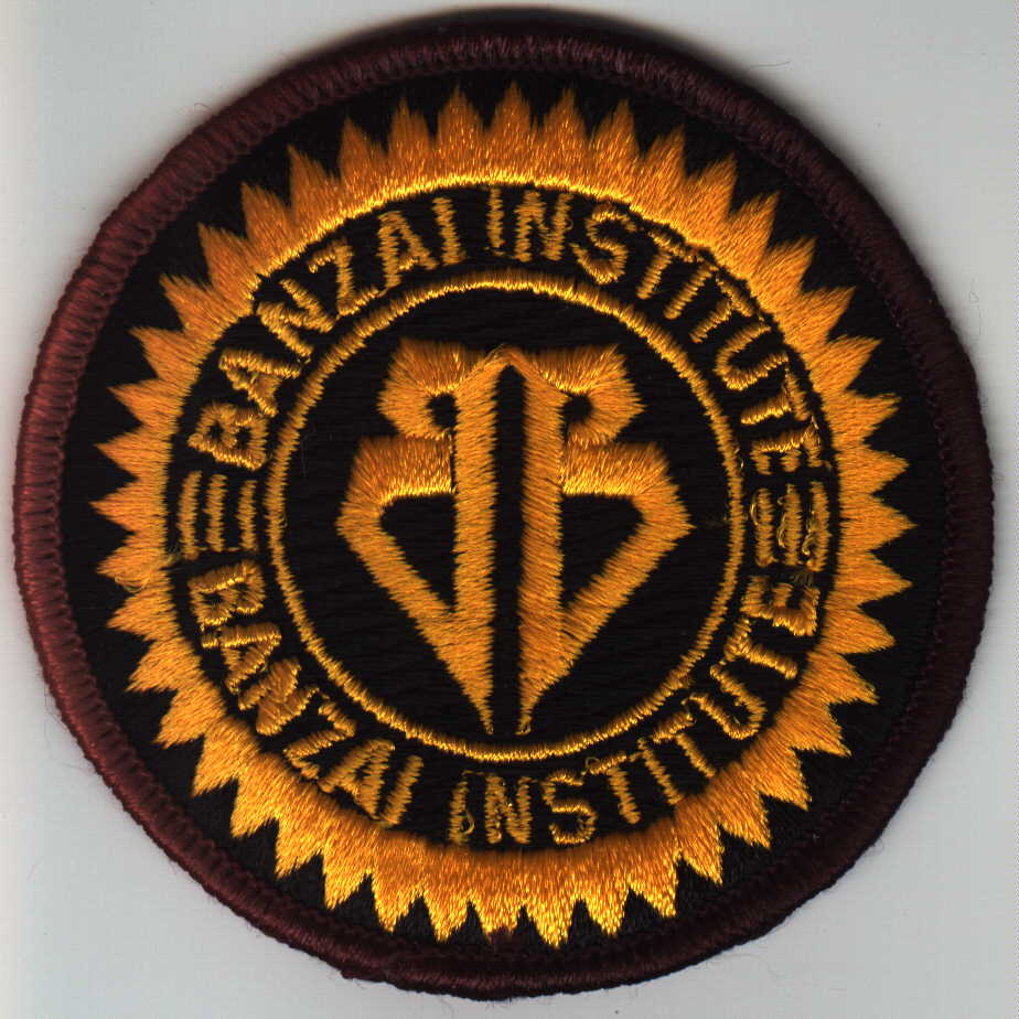 Institute logo patch in yellow on black
