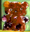 picture of collaged teddy bear featuring coloured wool