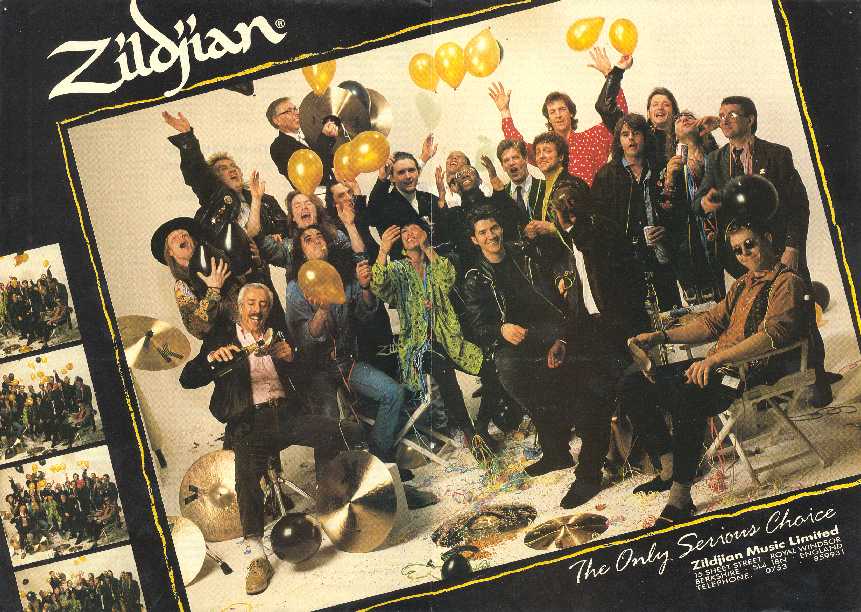 Gary celebrating with a gaggle of prime UK drummers in 1990. 
Notes - Gary stands between Mark Mondesir and Preston Hayman.
Mel Gaynor is in the backround, as is Pete Thomas (The Attractions)
In front of Gary are Dougie Vipond (Deacon Blue) and Frank Tontoh.
To the right, note Dave Mattacks hitting Phil Gould on the head with a balloon!
You may recognise Trevor Thornton, Jody Linscott, Mark Price and others.