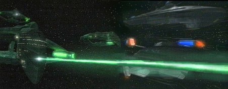 The Caterina, with her two holo-modules, firing at the Phoenix-X as its vectoring.