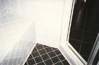 Another angle of tiled shower