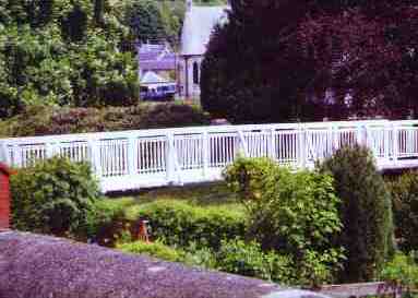 The Park footbridge straddles the river Wauchope