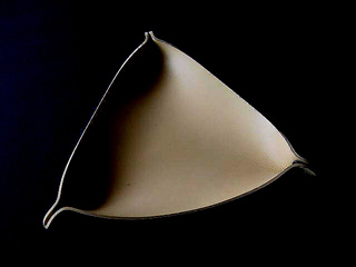 triangle bowl, rubber, by JANETTE TIMMERMANS, 1983. Diameter 28 cm.