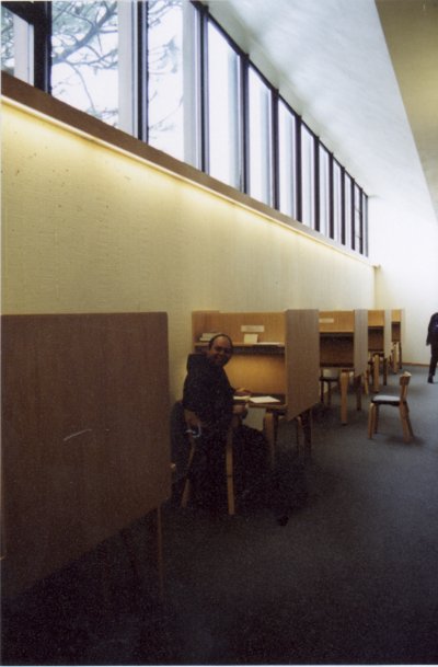 Photo of the study carrols along the back of the wall. We tried to get a picture of him studying, but he somehow knew we were there and turned around to smile.